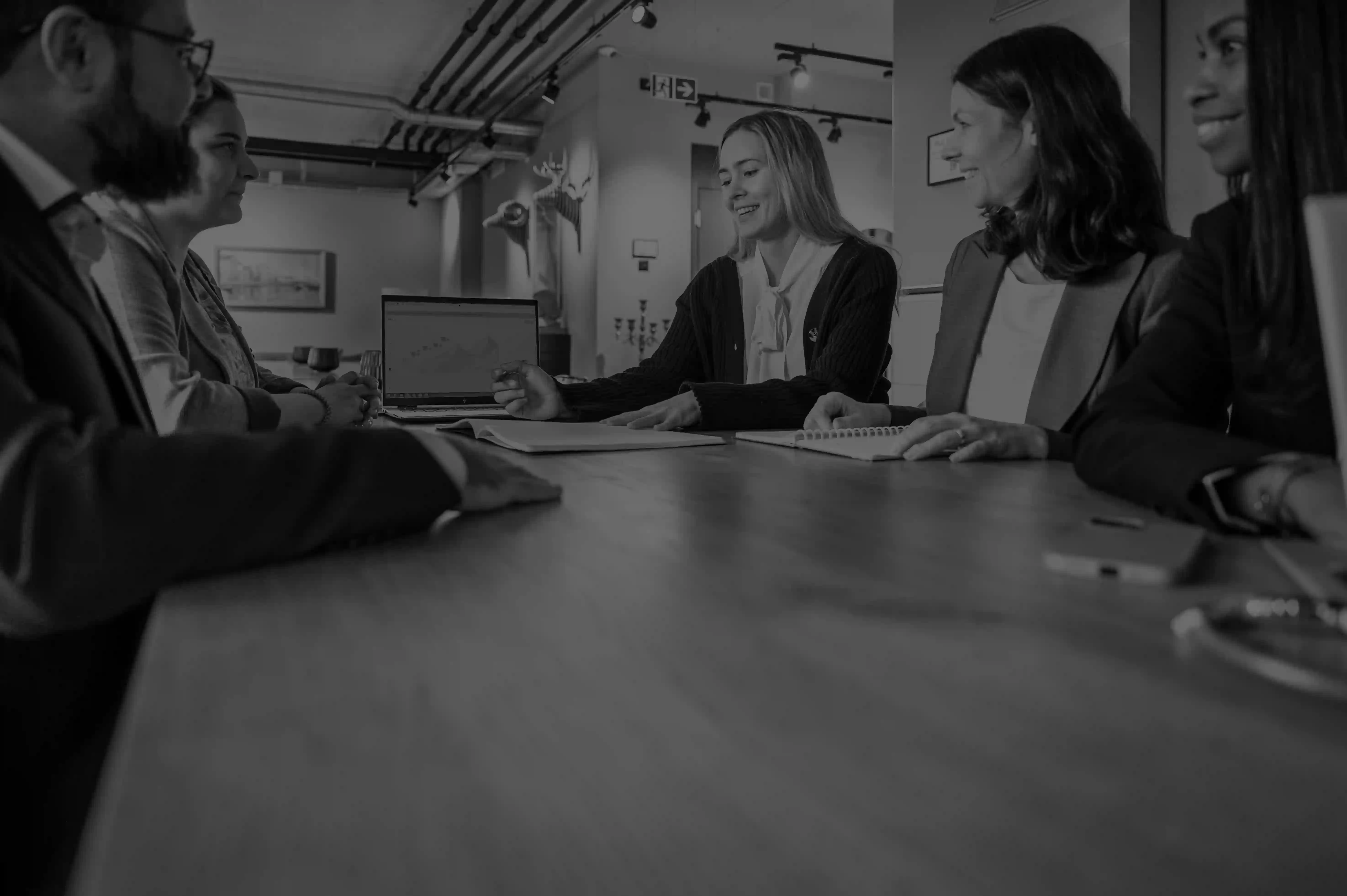 A SmartPath team meeting – sitting around the table.